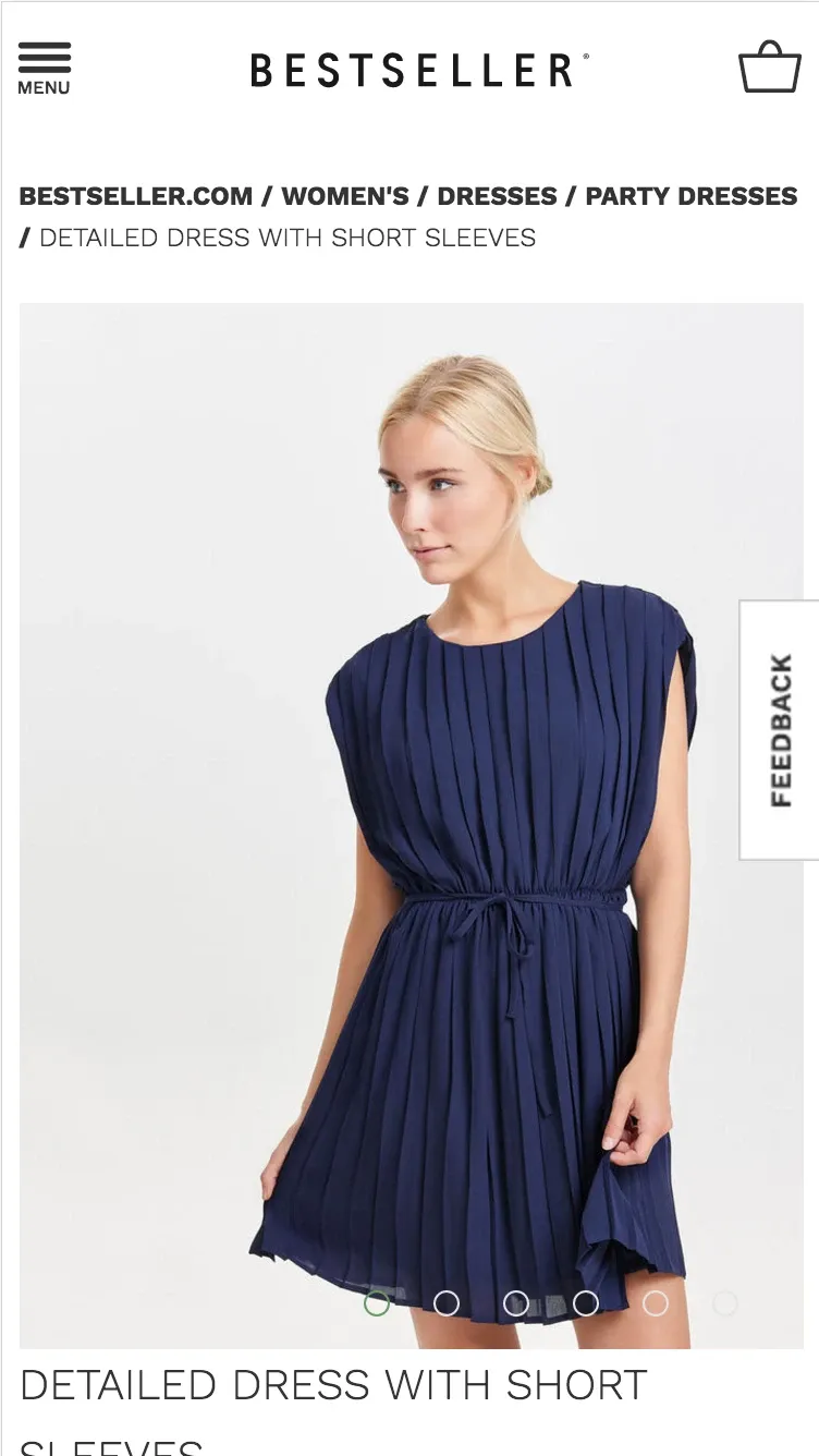 The product page on a phone: the photos as a swipeable carousel with dots, the product name below